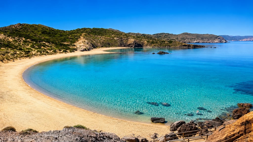 The reddish north coast of Menorca around Cavalleria